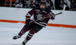 Alex Laurenza of the Union Garner Chargers pursues the puck during an NCAA men's ice hocke...