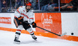David Ma of the Princeton Tigers pursues the puck during an NCAA men's ice hockey game at...