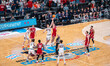 Tomislav Ivisic #13 of the Illinois Fighting Illini and Aleksas Bieliauskas #32 of the Wis...