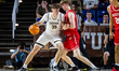 Hank Alvey (35) of the Lehigh Mountain Hawks posts up on Ben Defty (14) of the Boston Univ...