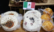 Mexican cheeses are sold at a stand at the World Fair in the External Plaza of the Monterr...