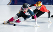 Kazuki Yoshinaga of Japan and Zhang Bohao of China compete in the Men's 5000m Relay Quarte...