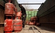Domestic empty gas cylinders are at a gas agency in Sopore, Jammu and Kashmir, India, on M...