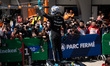 Mercedes-AMG Petronas F1 Team driver #63 George Russell (GBR) celebrates on top of his car...