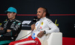 Scuderia Ferrari HP driver #44 Lewis Hamilton (GBR) participates in the post-race press co...