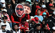 SHANGHAI, CHINA - MARCH 14:
Fans display portraits of Scuderia Ferrari HP drivers Charles...