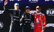 George Russell, Andrea Kimi Antonelli of Mercedes and Lewis Hamilton of Ferrari after the...