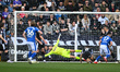James Belshaw of Notts County acts as Armando Dobra of Chesterfield scores a goal to make...