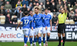 Referee Matthew Corlett shows a yellow card to Tom Naylor of Chesterfield during the Sky B...