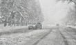 Snowfall occurs in Toronto, Ontario, Canada, on March 13, 2026. The storm is expected to d...