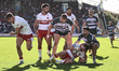 Jack Broadbent is tackled during the BetFred Super League match between Huddersfield Giant...