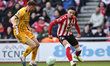 James Milner of Brighton and Hove Albion tackles Chemsdine Talbi of Sunderland during the...