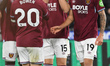 Konstantinos Mavropanos of West Ham United celebrates with Jarrod Bowen after scoring the...