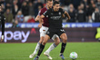 Rodri of Manchester City is challenged by Tomas Soucek of West Ham United during the Premi...