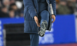 Nuno Espirito Santo, manager of West Ham United, gestures to his foot during the Premier L...