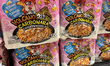 Packages of Korean volcano spicy carbonara chicken ramen noodles are sold at a grocery sto...