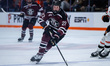 Jacob Jeannette of the Union Garnet Chargers pursues the puck during an NCAA men's ice hoc...