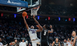#35 NJ Benson of the DePaul Blue Demons makes a layup during the BIG EAST Men's Basketball...
