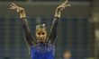Jordan Chiles of the UCLA Bruins competes on the balance beam against the Utah Utes at UCL...