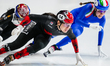 Courtney Sarault of Canada skates ahead of Elisa Confortola of Italy in the Women's 3000m...