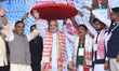 Union Home Minister Amit Shah is felicitated with a traditional Assamese 'japi', a hat, du...