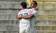 Daniele Montevago celebrates with his teammate Giacomo Manzari of AC Perugia Calcio after...