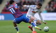 Brennan Johnson of Crystal Palace competes with Gabriel Gudmundsson of Leeds United during...