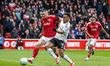Nikola Milenkovic of Nottingham Forest and Rodrigo Muniz of Fulham compete for the ball du...