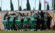 Floriana players and technical staff members huddle ahead of the YoHealth Malta Premier Le...