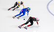 Danae Blais of Canada skates ahead of Elisa Confortola of Italy and Tineke Den Dulk of Bel...