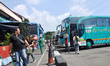 Prospective passengers prepare to board the Intercity Interprovincial (AKAP) bus at the Ka...
