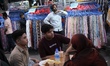 A vendor waits for customers before iftar during Ramadan, ahead of Eid al-Fitr, at New Mar...