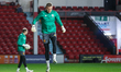 Cambridge United's goalkeeper Jake Eastwood warms up during the Sky Bet League 2 match bet...