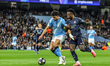 Matheus Nunes of Manchester City controls the ball under pressure from Vinicius Junior of...