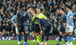 Real Madrid players surround referee Clement Turpin during the UEFA Champions League last...