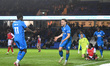 Archie Collins of Peterborough United celebrates after scoring the team's fifth goal durin...