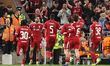 Dominik Szoboszlai of Liverpool celebrates his goal to make it 1-0 (1-1 aggregate) with te...