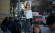 A poster advertising Fidesz candidate Orsolya Ferencz with the text "the safe candidate" i...