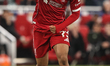 Rio Ngumoha of Liverpool breaks with the ball during the UEFA Champions League last 16 sec...