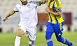 Yacine Brahimi (left) of Al-Gharafa SC and Hamad Mansour Rajah of Al-Ahli SC in action dur...