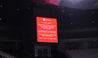 A stadium screen displays a security alert message during the Qatar Stars League match bet...