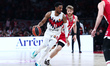 Trent Forrest of Baskonia competes with Thomas Walkup of Olympiacos during the EuroLeague...