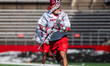 Jordan Smikle of the Rutgers Scarlet Knights holds the ball during an NCAA men's lacrosse...