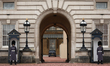 A King's Guard stands on the street near Buckingham Palace in London, United Kingdom, on F...