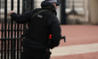 Police officers are seen on the street near Buckingham Palace in London, United Kingdom, o...