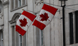 A Canadian flag hangs on a building on February 17, 2026, in London, United Kingdom. 