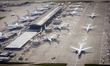 A view from a departing aircraft shows Heathrow Terminal 5C with British Airways aircraft...