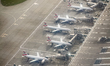 A view from a departing aircraft shows the main Terminal 5 building at Heathrow Airport wi...