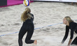 Sara Hughes of the United States dives for the ball during the semifinal match against Lit...