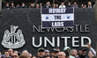 Newcastle fans gather outside St James' Park as they wait for Sunderland fans during the P...